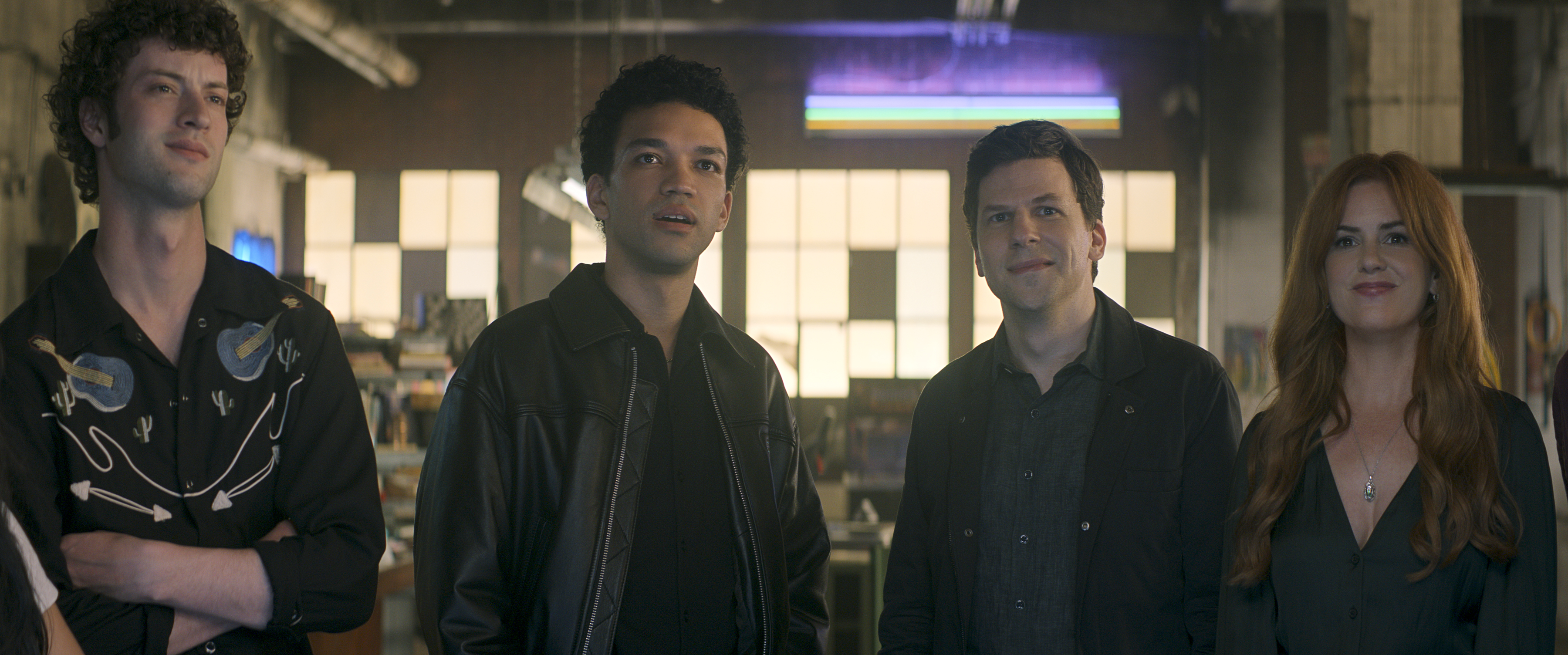 Magicians performing synchronized illusion